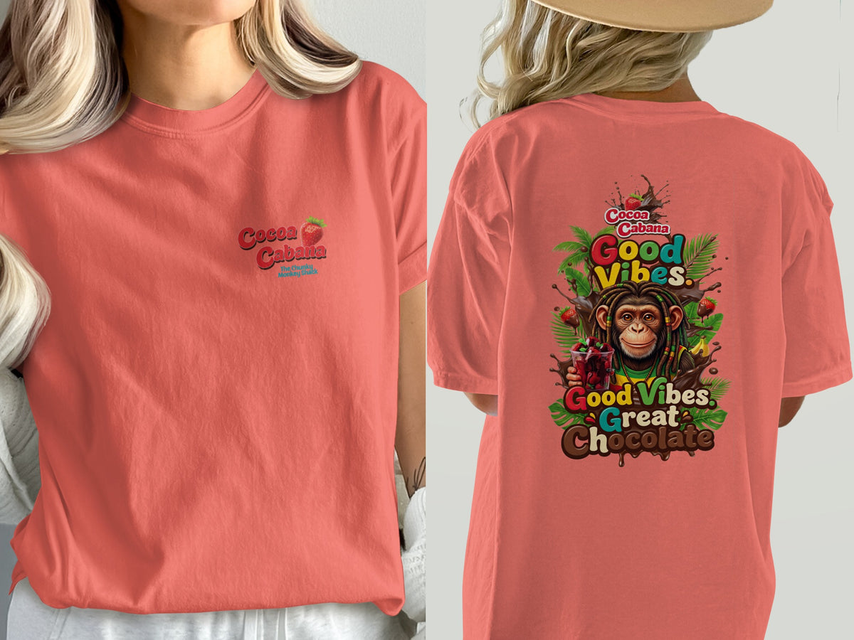 Coral t-shirt with "Cocoa Cabana" on front and monkey with "Good Vibes. Great Chocolate" on back.