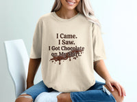 Cream t-shirt with "I Came. I Saw. I Got Chocolate on My Shirt." text.