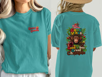 Teal t-shirt with "Cocoa Cabana" on front and monkey, chocolate, and text on back.