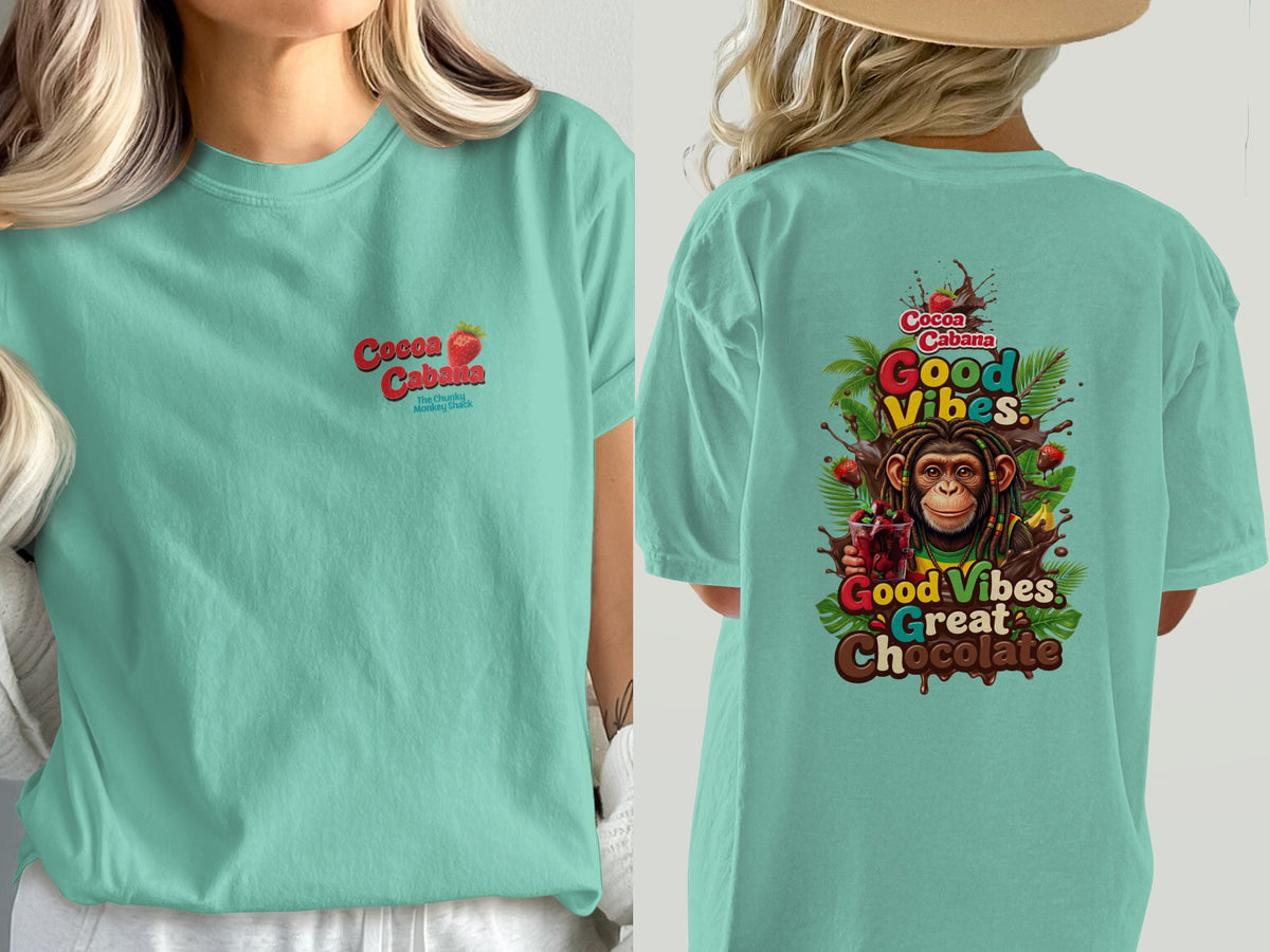 Teal t-shirt with front "Cocoa Cabana" logo and back "Good Vibes Great Chocolate" monkey graphic.