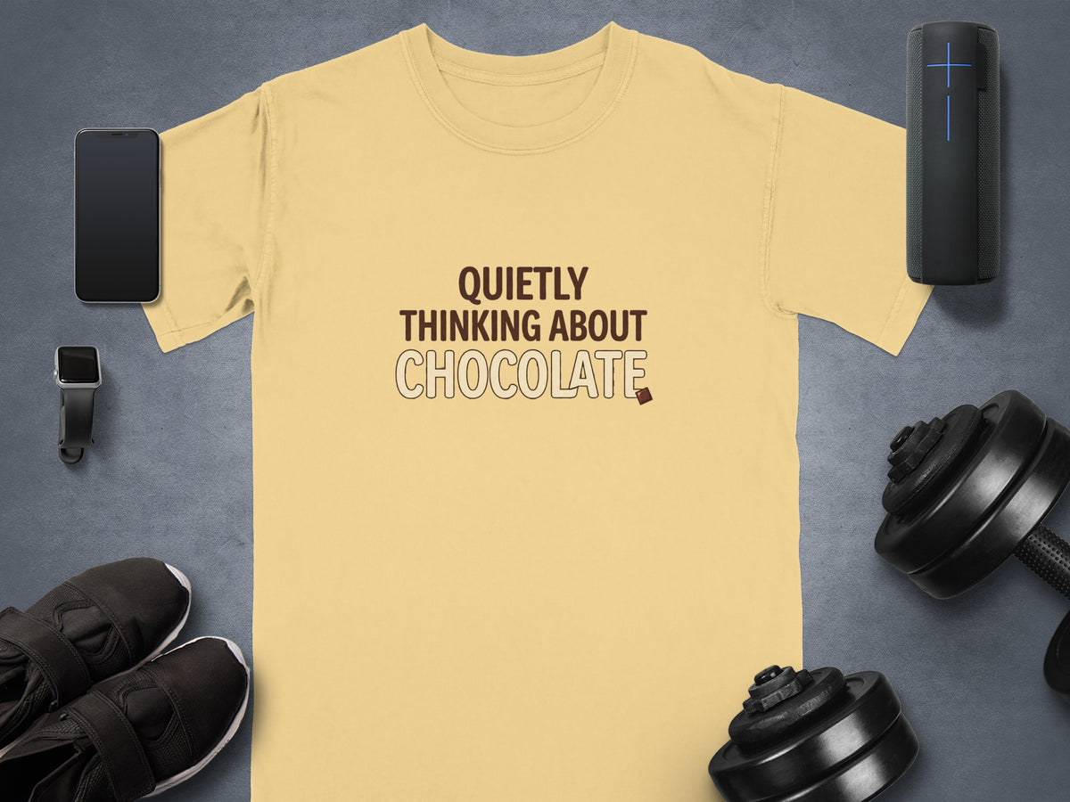 Light yellow t-shirt with "QUIETLY THINKING ABOUT CHOCOLATE" text.