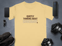 Light yellow t-shirt with "QUIETLY THINKING ABOUT CHOCOLATE" text.
