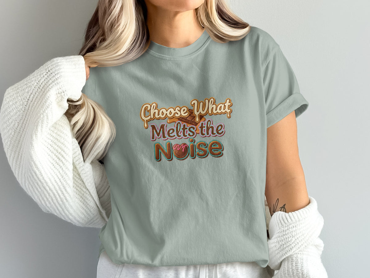 T-shirt graphic with text "Choose What Melts the Noise" and chocolate bar.