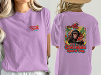 Lavender t-shirt with the Cocoa Cabana logo on the left and a chimpanzee eating dessert on the back.