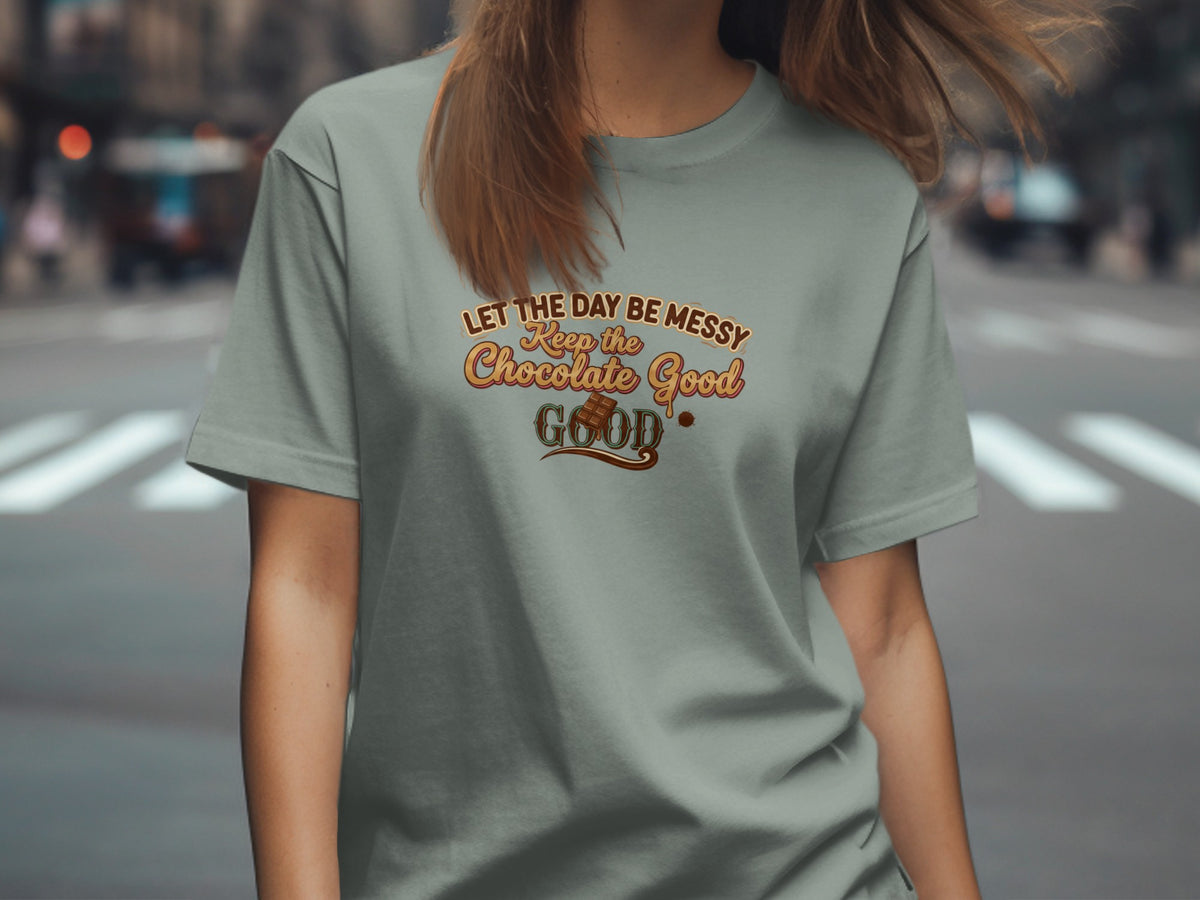 T-shirt with text "Let the day be messy Keep the Chocolate Good".