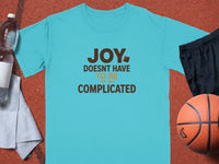 Turquoise t-shirt with "JOY DOESNT HAVE TO BE COMPLICATED" text.