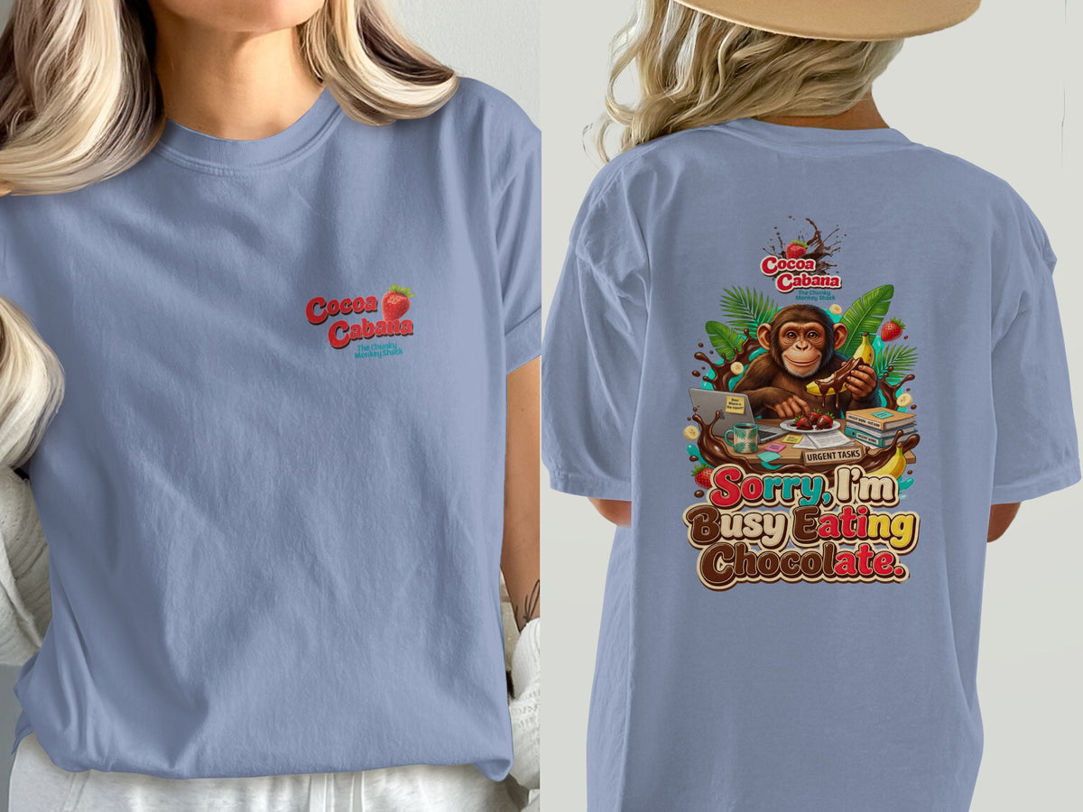 Front: Cocoa Cabana logo. Back: Monkey eating chocolate with "Sorry, I'm Busy Eating Chocolate" text.