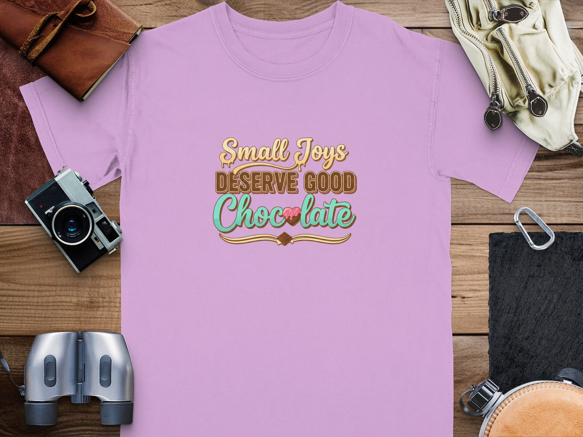 Lilac t-shirt with text "Small Joys Deserve Good Chocolate" and chocolate design.