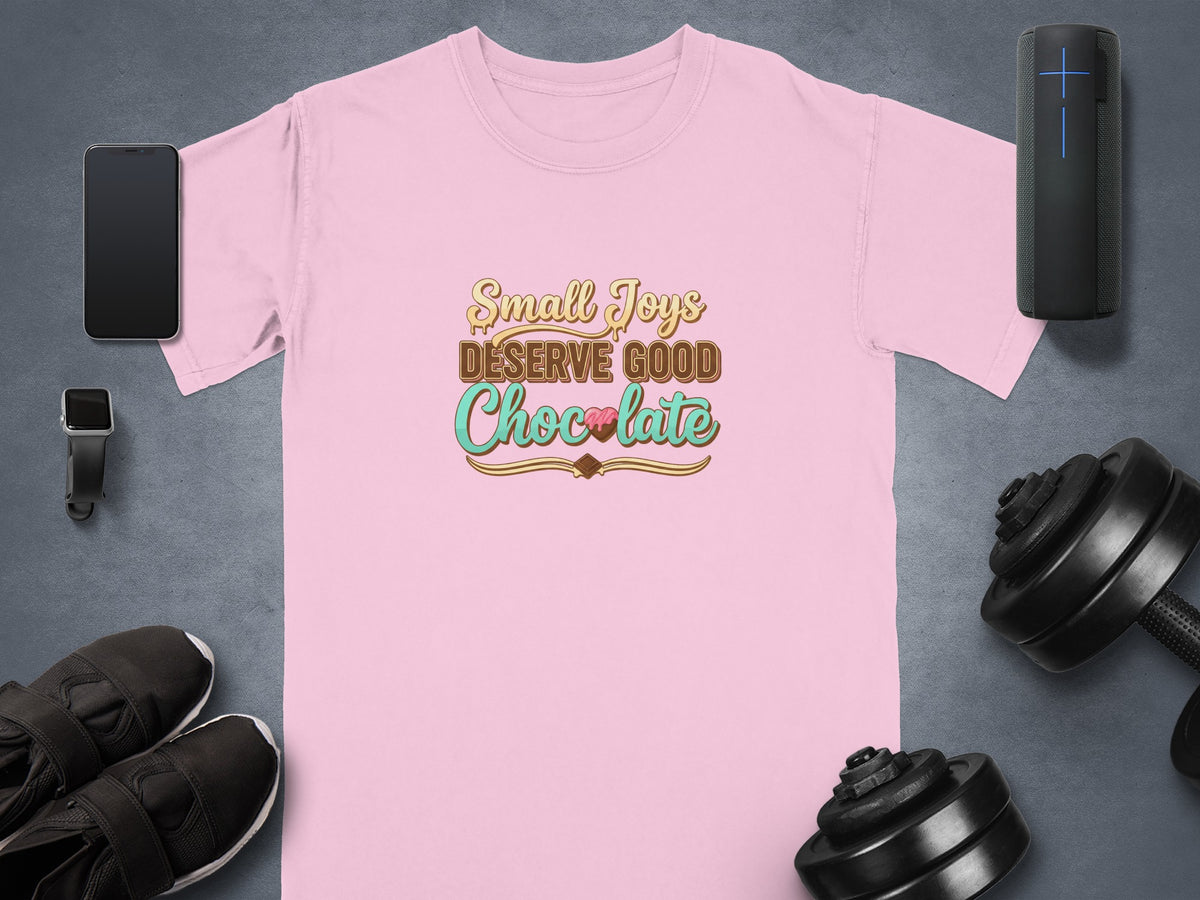 Pink t-shirt with "Small Joys Deserve Good Chocolate" text.