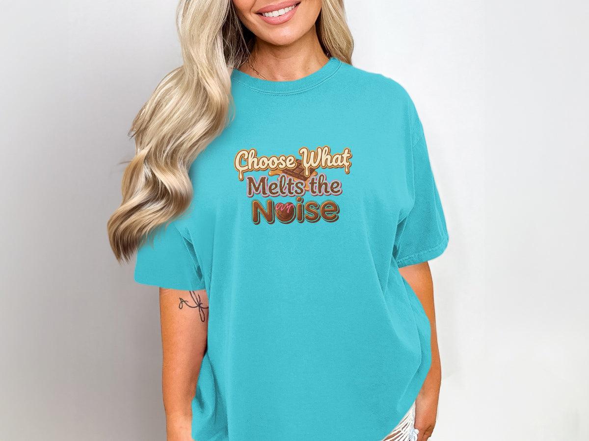 Teal t-shirt with brown text "Choose What Melts the Noise" and donut graphic.