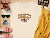 Cream t-shirt with "Let the day be messy, Keep the Chocolate Good" text.