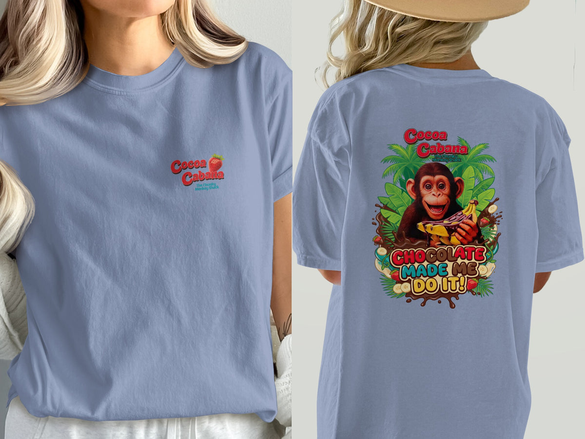 Blue t-shirt with Cocoa Cabana graphic and monkey eating chocolate.