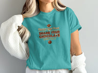 Teal t-shirt with text "PROTECT YOUR PEACE SHARE YOUR CHOCOLATE CAREFULLY".