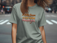 Grey t-shirt with "A Little Cocoa A Lot More Human" text and heart graphic.