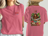 Pink t-shirt with logo on front and monkey eating chocolate graphic on back that says "Sorry, I'm Busy Eating Chocolate."