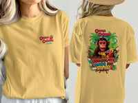 Yellow t-shirt with "Cocoa Cabana The Chunky Monkey Shack" on the front and a monkey with bananas on the back.