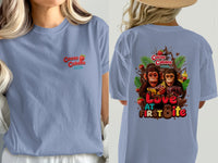 Light blue t-shirt with Cocoa Cabana logo and two monkeys with chocolate and fruit on the back.