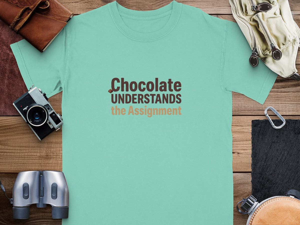 Mint t-shirt with "Chocolate UNDERSTANDS the Assignment" text.