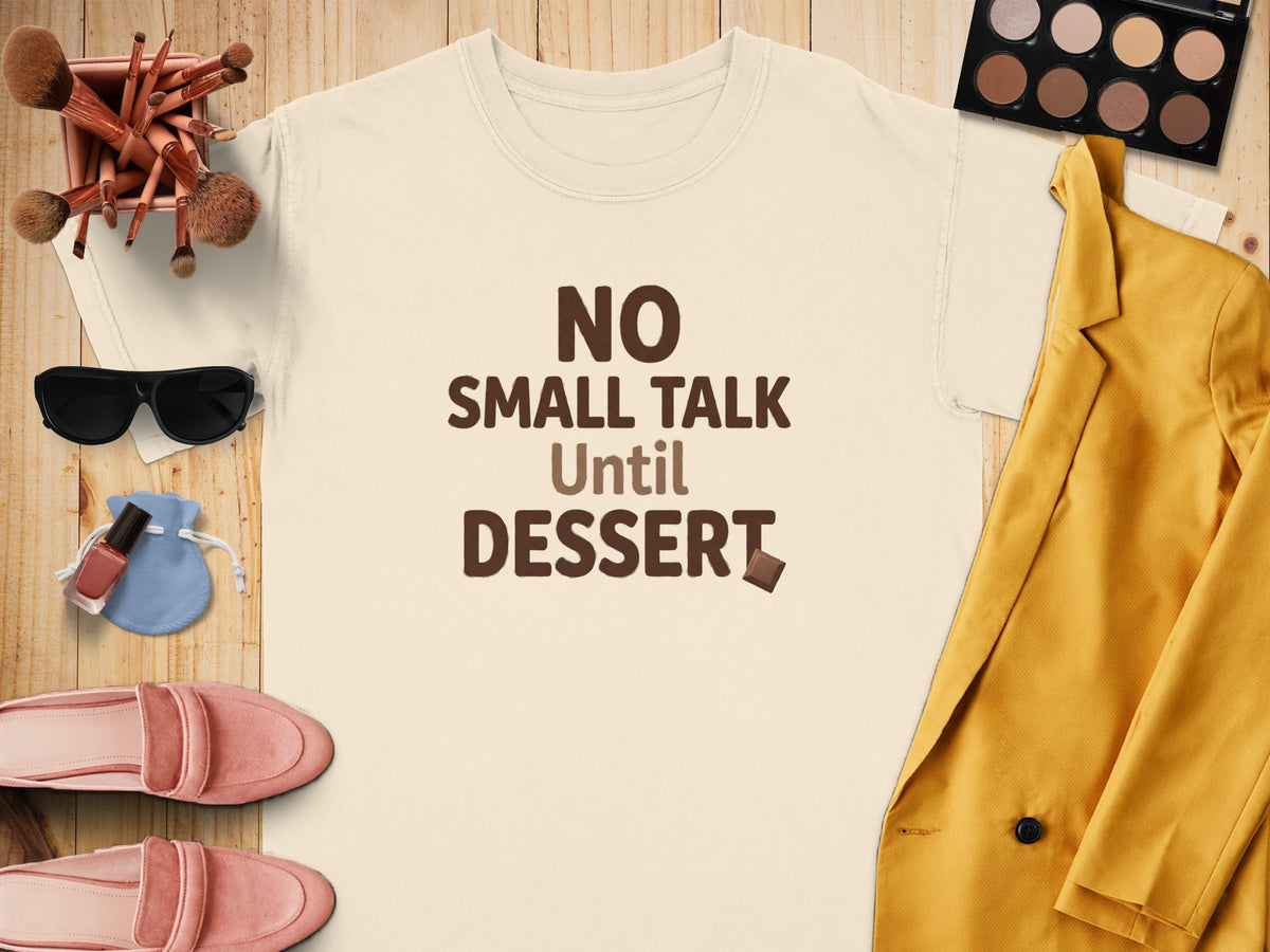 Cream t-shirt with text "NO SMALL TALK Until DESSERT" and chocolate accent.
