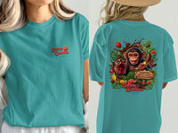 Teal t-shirt with left chest Cocoa Cabana logo and back graphic of a monkey eating chocolate.