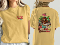 Yellow t-shirt with "Cocoa Cabana" logo and monkey with "Sorry I'm Busy Eating Chocolate" text.