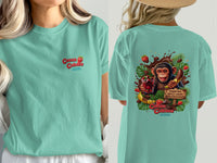 Island Reef green t-shirt with front text Cocoa Cabana and back design of monkey with chocolate and fruit.
