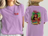 Lilac t-shirt with "Cocoa Cabana" and strawberry on front, monkey with banana on back.