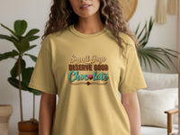 Yellow t-shirt with "Small Joys Deserve Good Chocolate" text and chocolate graphics.