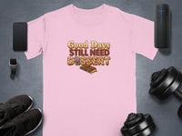 Pink t-shirt with "Good Days Still Need Dessert" text and chocolate bar graphic.