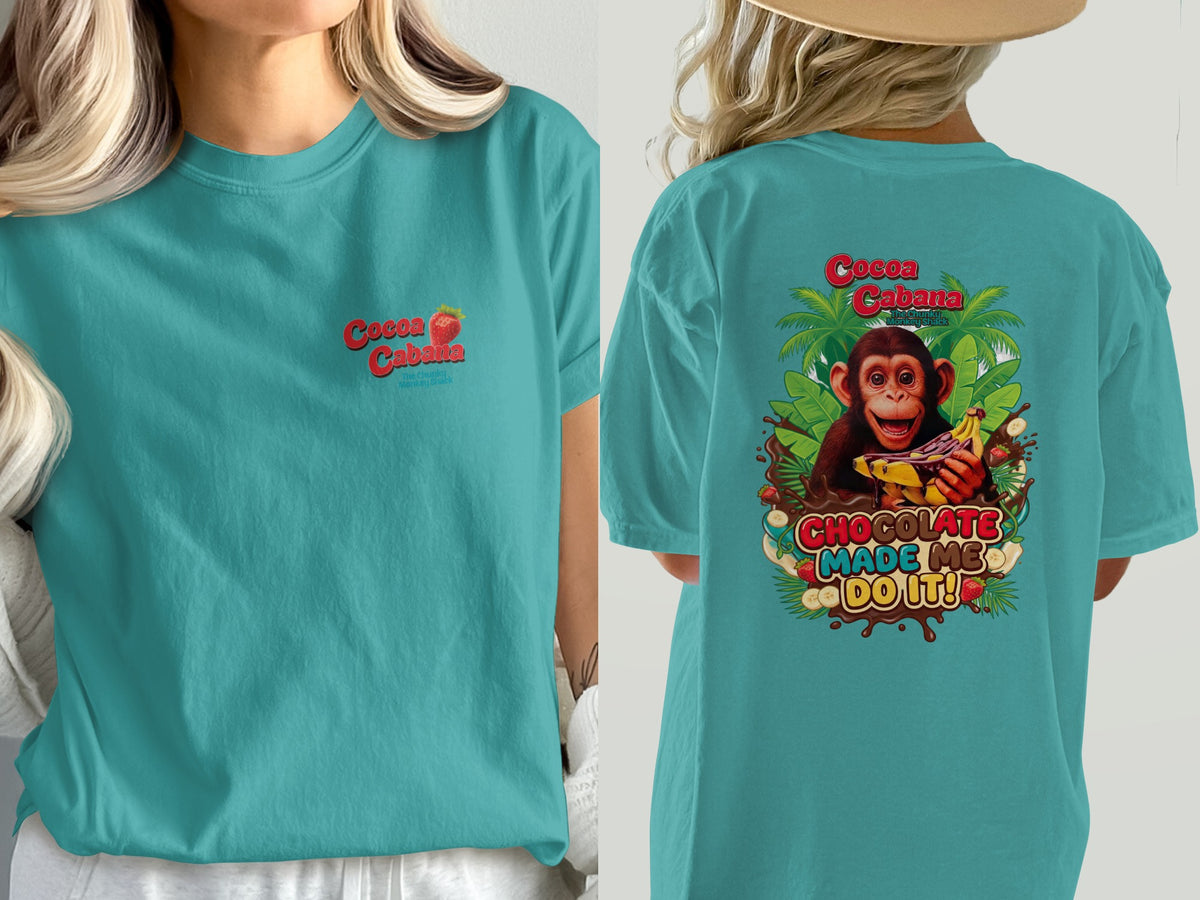 Teal t-shirt with front graphic: "Cocoa Cabana The Chunky Monkey Shack". Back graphic: Monkey with bananas, chocolate, and text "CHOCOLATE MADE ME DO IT!".