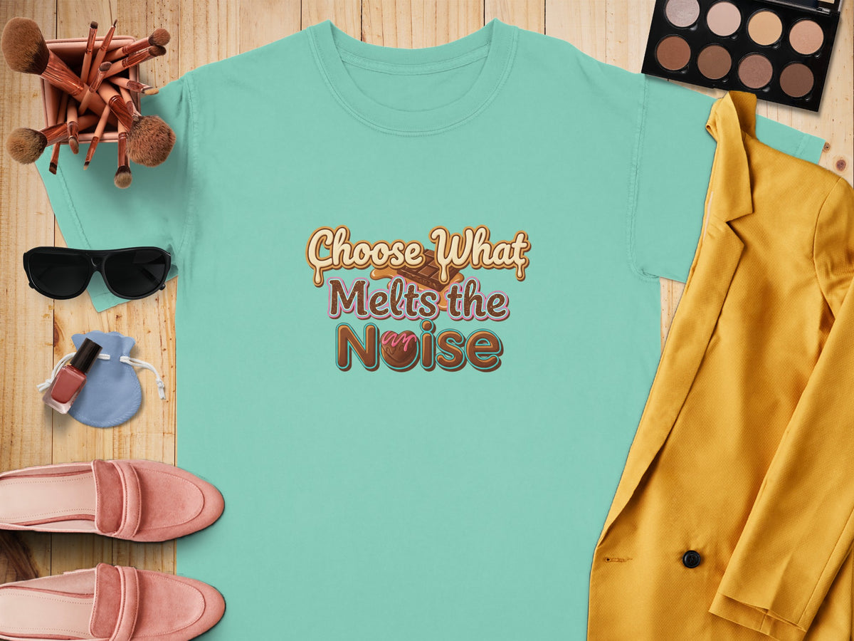 Aqua t-shirt with "Choose What Melts the Noise" graphic and chocolate design.