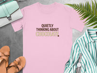 Pink t-shirt with "Quietly Thinking About Chocolate" text and a chocolate bar graphic.