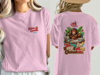 Pink t-shirt with "Cocoa Cabana The Chunky Monkey Shack" on front and monkey eating chocolate on back.