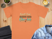 Orange t-shirt with "Small Joys DESERVE GOOD Chocolate" text and chocolate bar graphic.