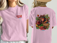 Pink t-shirt with "Cocoa Cabana" logo and a monkey with chocolate and strawberries.