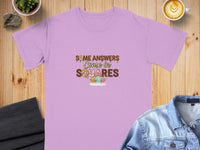 Lilac t-shirt with text "SOME ANSWERS Come in SQUARES" and candy squares.