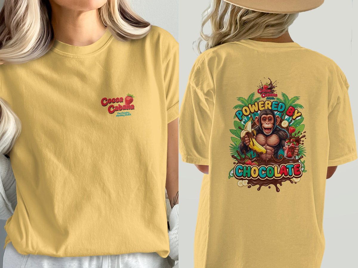 Yellow t-shirt with "Cocoa Cabana" logo and "Powered by Chocolate" monkey graphic.